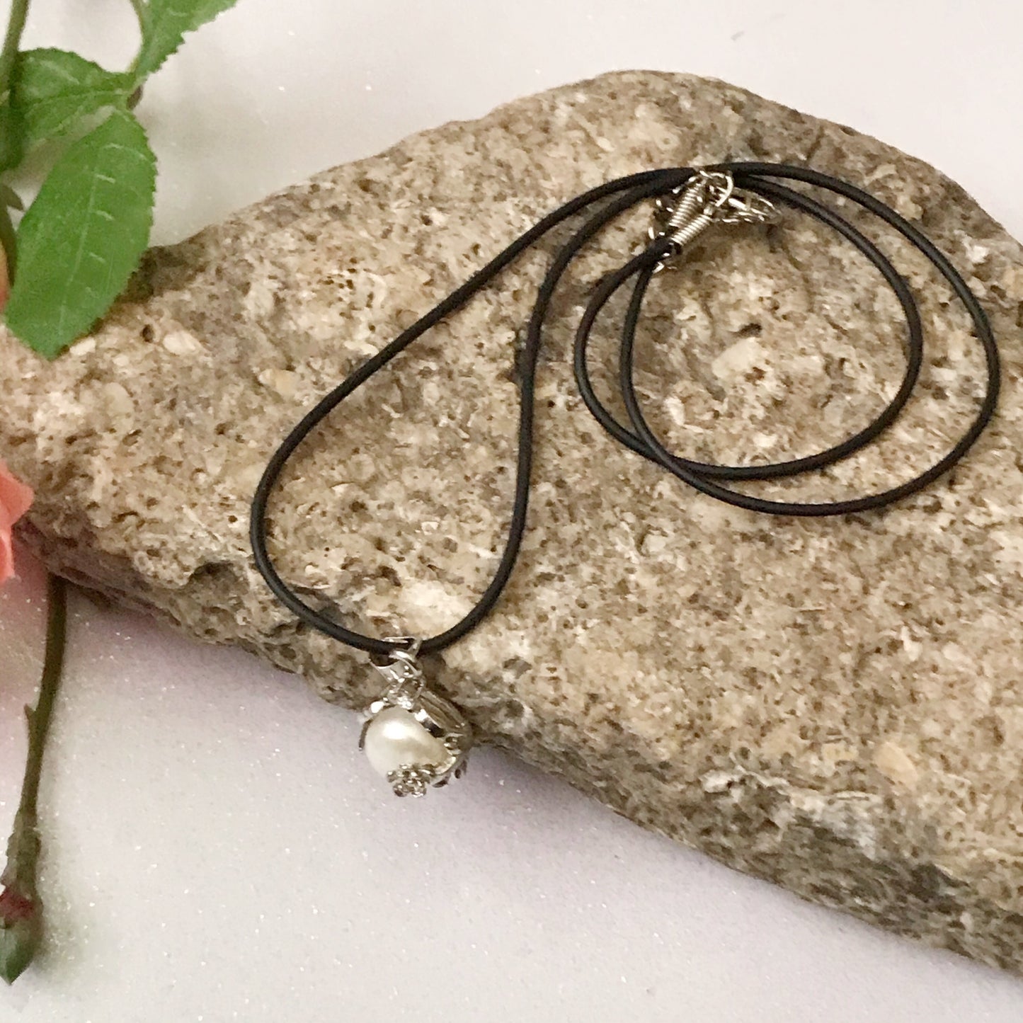 Single real pearl on black leather cord - The Lotus Wave