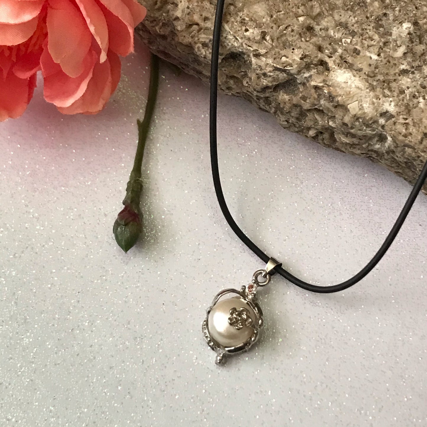 Single real pearl on black leather cord - The Lotus Wave